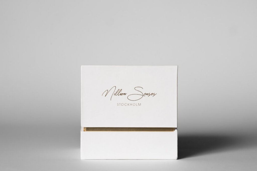 minimalist luxury packaging with subtle foil accents and spot UV finish