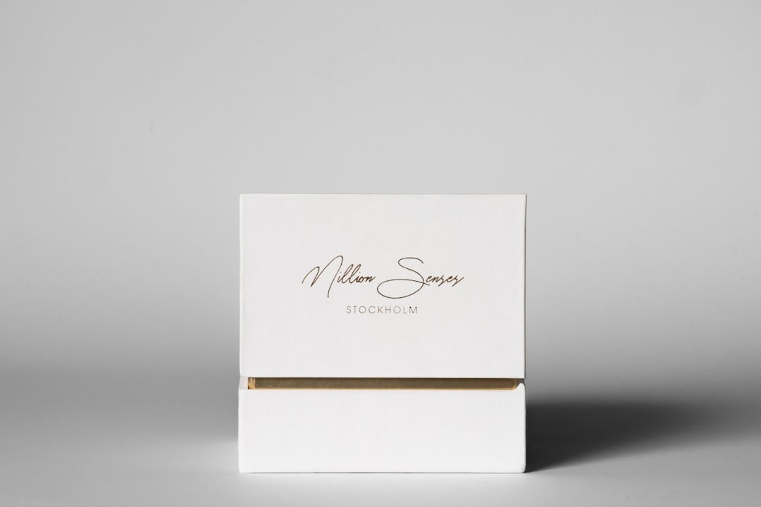 minimalist luxury packaging with subtle foil accents and spot UV finish